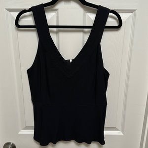 Sleeveless peplum top